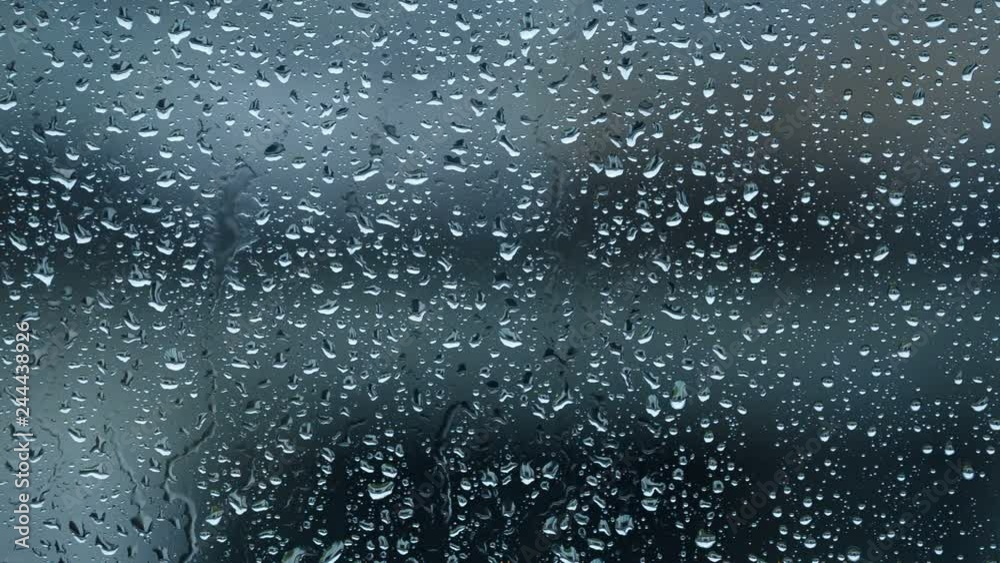 Rain water drops on a window close up Rain water drops on a window close up