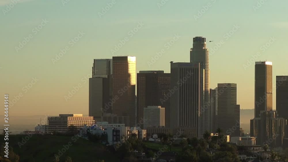 Downtown Los Angeles Skyline with helicopters and planes circling the buildings Downtown Los Angeles Skyline with helicopters and planes circling the buildings