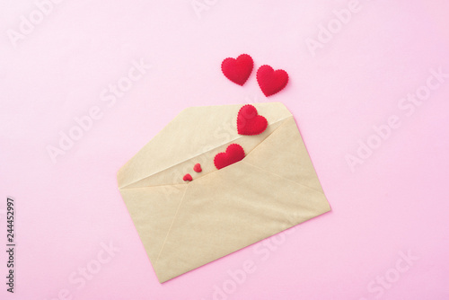 Valentine Day Red heart with letter envelope on pink background
