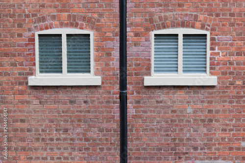 window and brick wall of old building