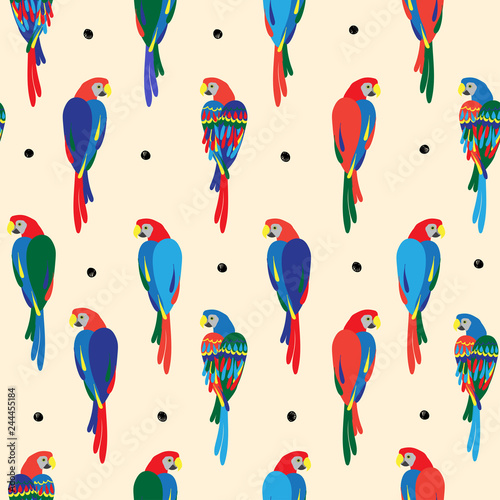 Seamless repeat pattern half drop with colorful tropical birds and black polka dots
