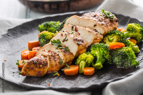 Roasted chicken breast with broccoli carrot and sesame