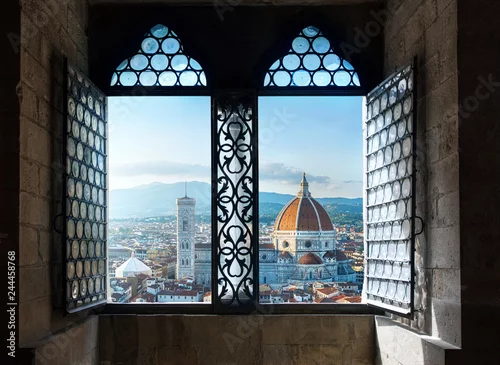 Fototapeta View from the old window on Florence Duomo Basilica di Santa Maria del Fiore.  Florence, Italy. Collage of the historical theme and the theme of travel.