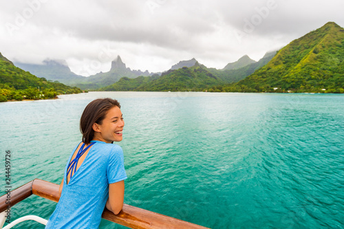 Tahiti cruise ship travel vacation woman on balcony of yacht traveling on exotic oceania adventure.