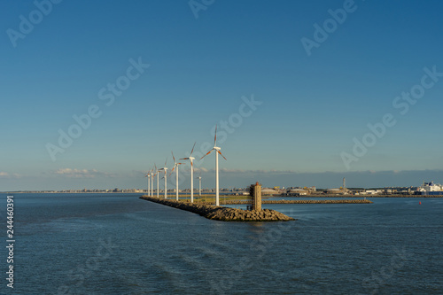Wind turbines near a harbor in the industrial area of ​​Zeebrugge