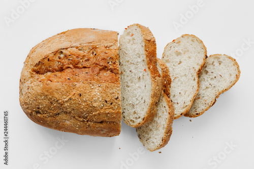 Loaf bread slices bread white background top view