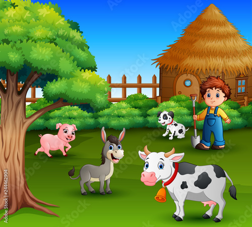A farmer at his farm with a bunch of farm animals