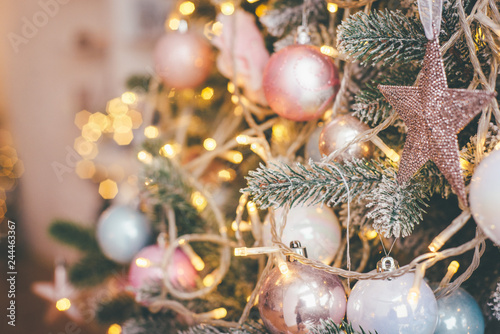 Closeup shot of the pastel Christmas tree decorations