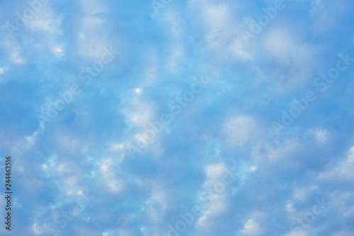 Full frame blue sky and cloud background.