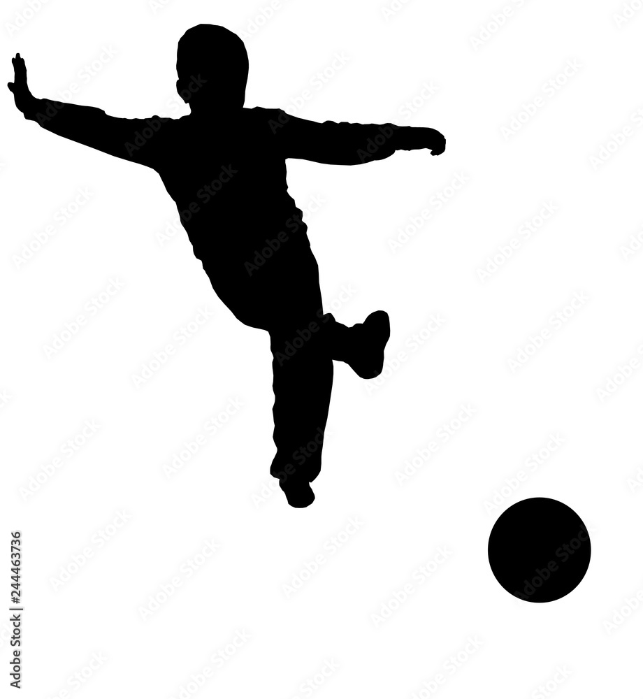 Silhouette ofa boy plays  soccer 