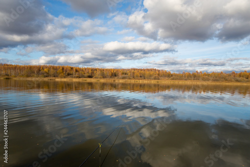 Fototapeta Naklejka Na Ścianę i Meble -  Autumn landscape - lake, clouds and forest