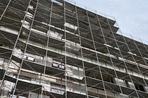 new building under construction, scaffolding and concrete © soleg