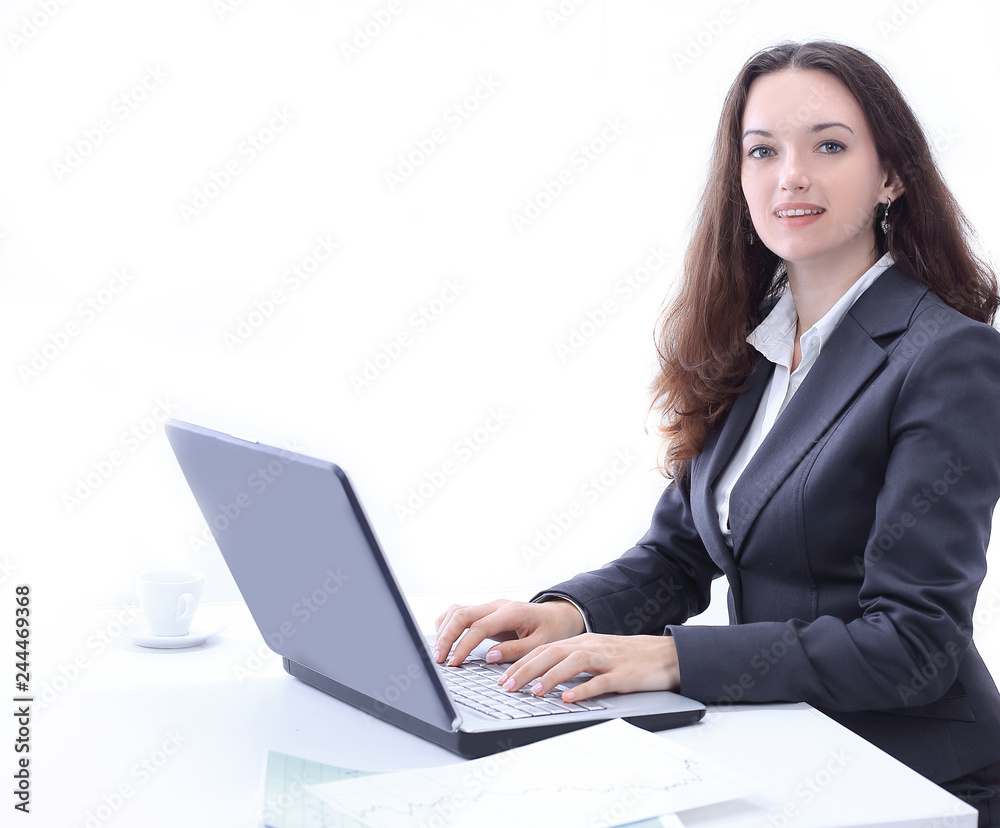 side view.business woman typing on a laptop. side view.business woman typing on a laptop.