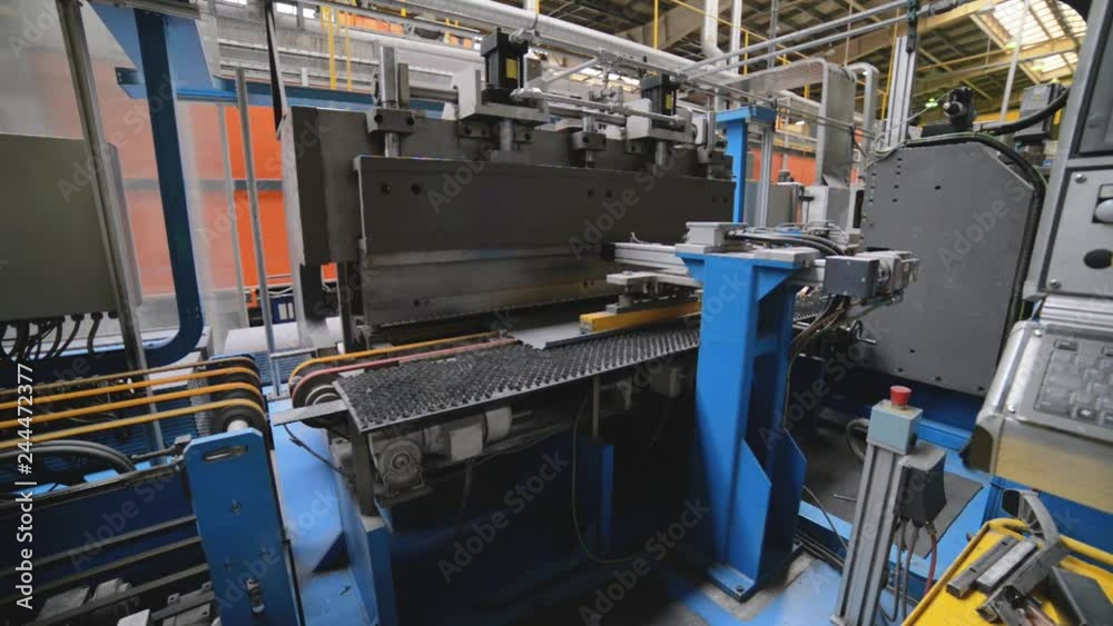 Roller forming machine. The interior of the plant producing a metal profile. Roller forming machine. The interior of the plant producing a metal profile.