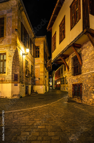 Picturesque narrow alley and neoclassical buildings at night  characteristics in the  old town of Xanthi.