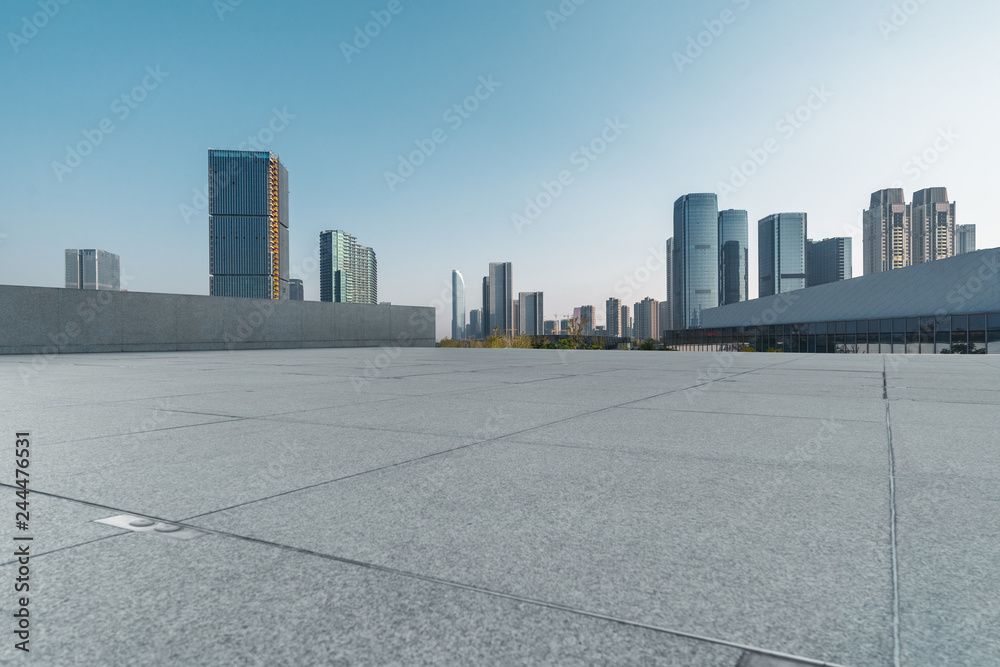 Fototapeta premium Panoramic skyline and buildings with empty square floor.