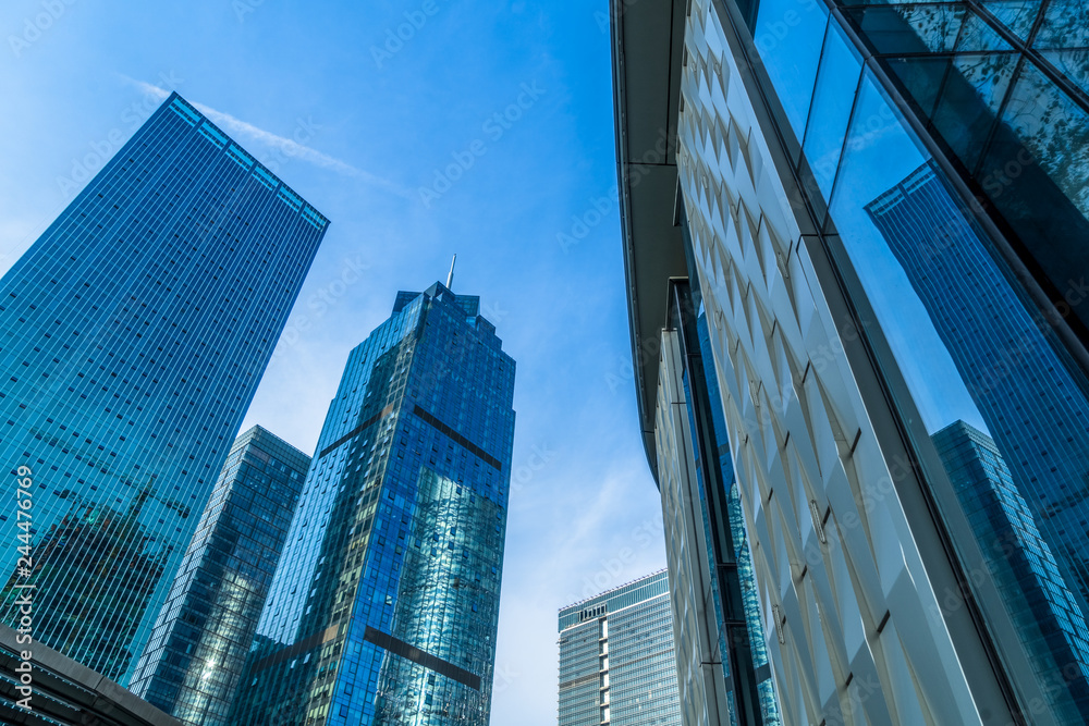 low angle view of skyscrapers in city of China. low angle view of skyscrapers in city of China.