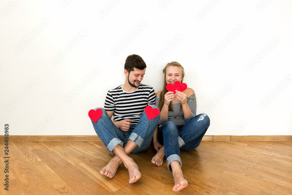 Funny young couple is celebraiting valentines day. Funny young couple is celebraiting valentines day.