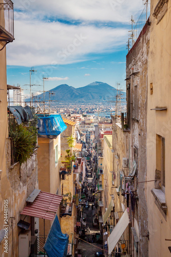 Old street in Naples (Napoli) with view of Vesuvius photo