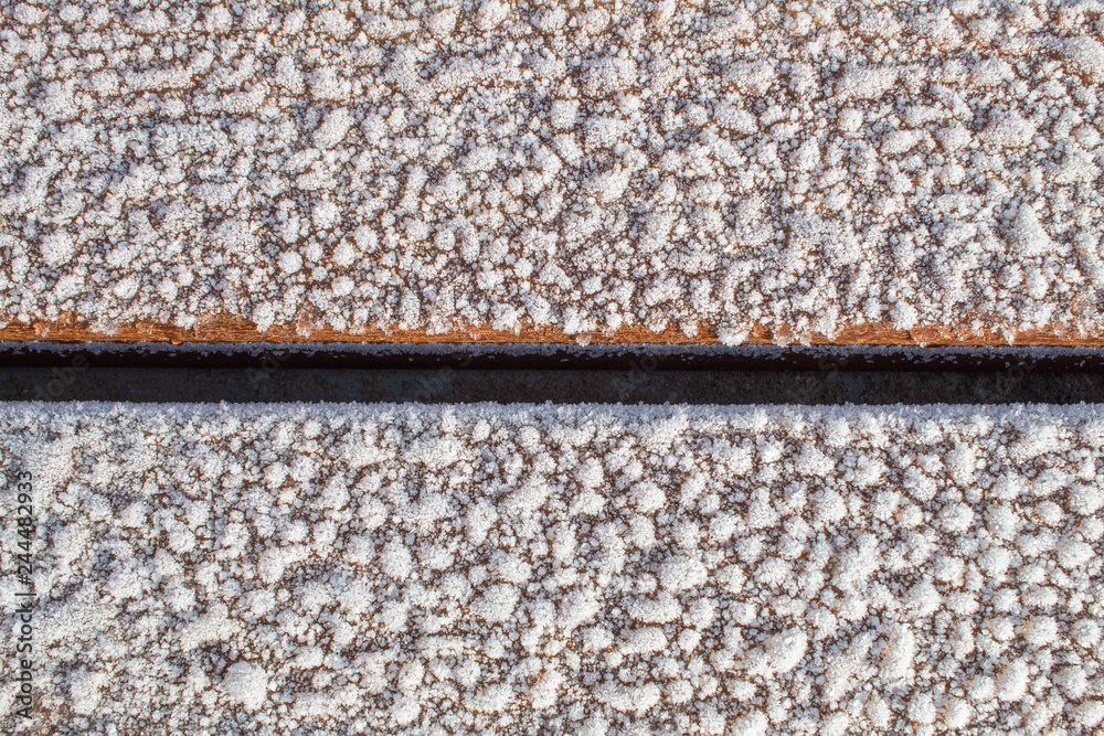 Background with wood texture and snow, place for text