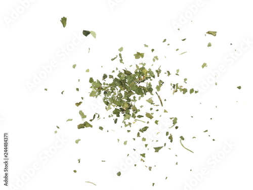 Chopped dry parsley leaves, pile isolated on white background, top view