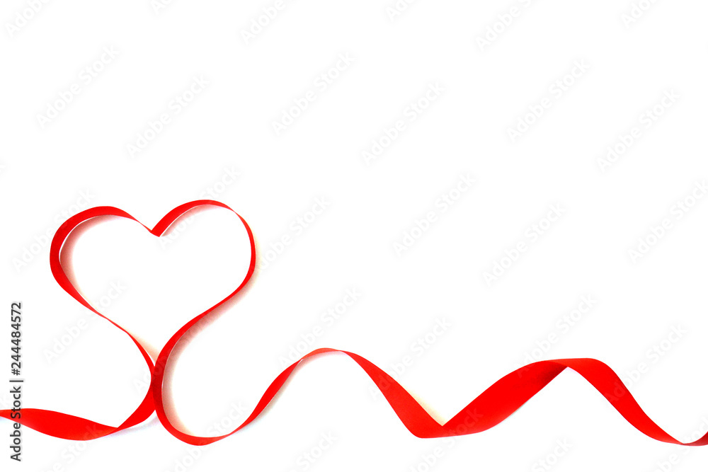 Isolated red satin ribbon in the shape of a heart on a white background with free space. The concept of love and Valentine Day Isolated red satin ribbon in the shape of a heart on a white background with free space. The concept of love and Valentine Day