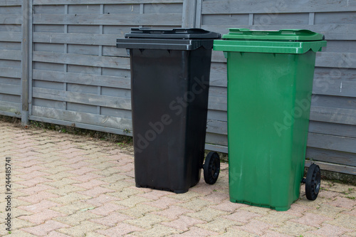 Collected kerbside waste bins on street photo
