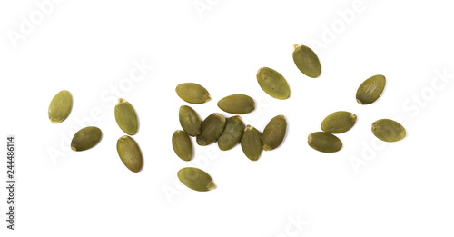 Pumpkin seeds isolated on white background, top view