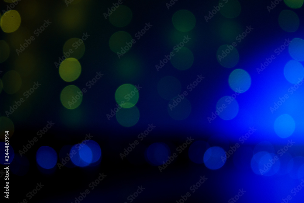 Blue and golden background with bokeh effect Blue and golden background with bokeh effect