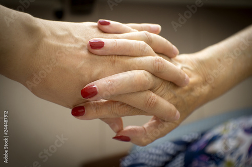 Hands of elderly person with senile dementia