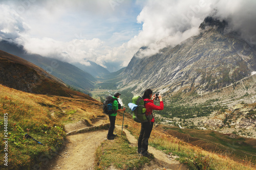 A hiking trip with a backpack of alpine mountains.
