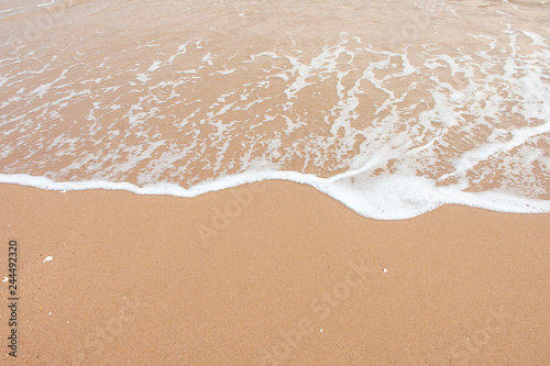Fototapeta Naklejka Na Ścianę i Meble -  Soft wave of the sea on the sandy beach.