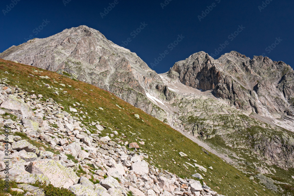 Panoramic view of the rock faces of Monte Cassina Baggio in the upper Bedretto valley in Switzerland
