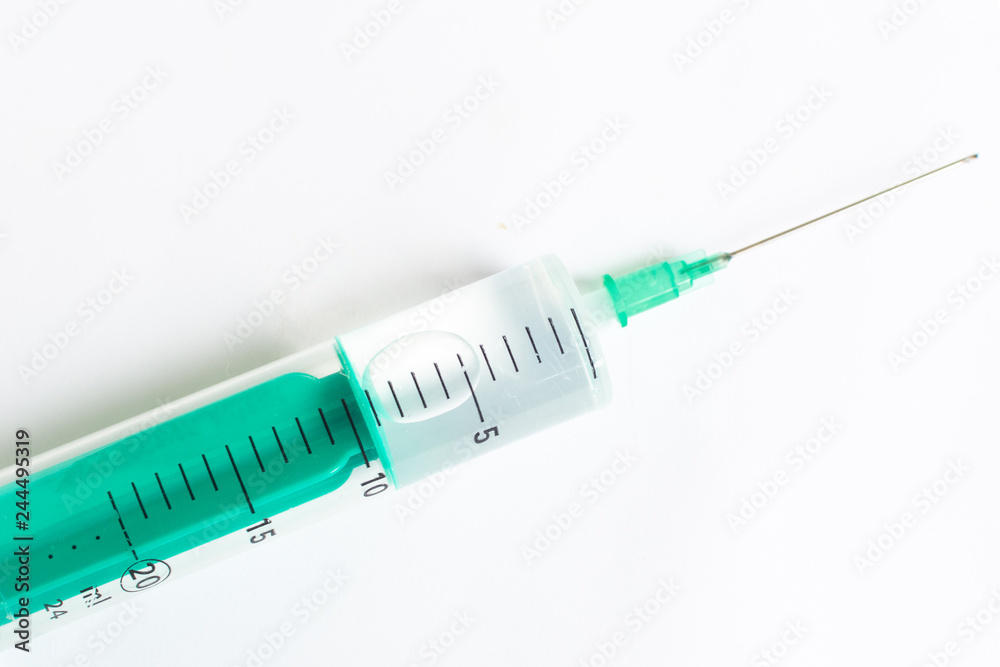 Syringe with injection closeup. Medicine treatment concept. Syringe with injection closeup. Medicine treatment concept.