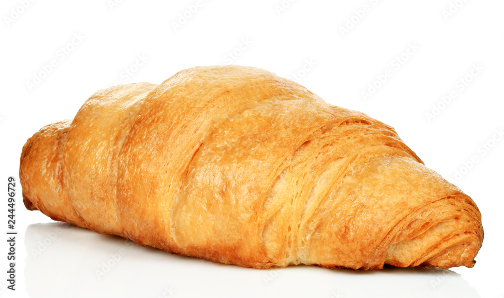 Big fresh croissant on white background
