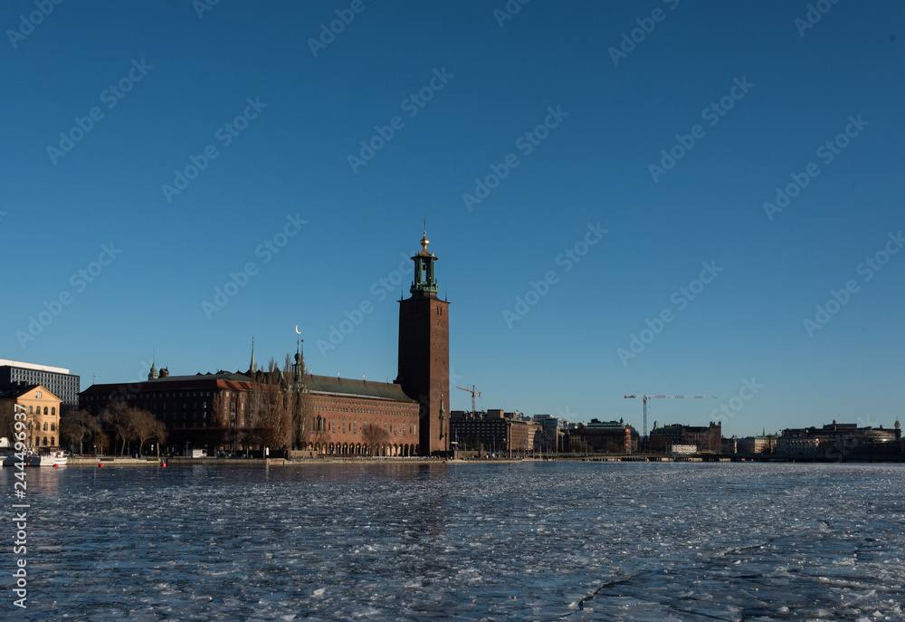 The Town City Hall in Stockholm a Sunny winter day at the frozen lake Mälaren