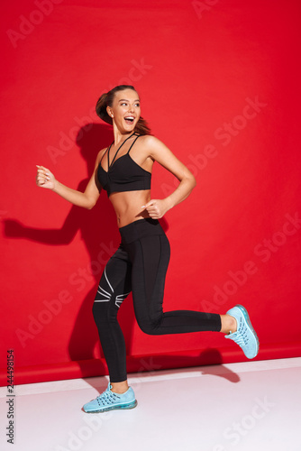 Full length portrait of a beautiful fit young sportswoman © Drobot Dean