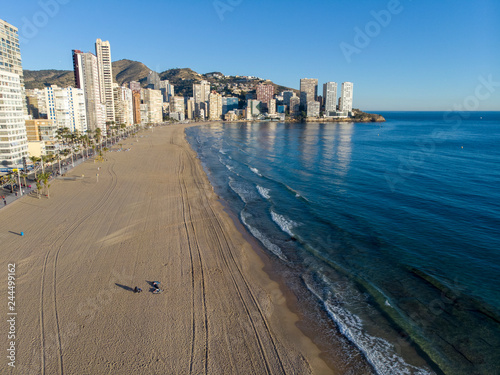 Aerial photo taken in Benidorm in Spain Alicante, showing the beautiful beach of Playa Levante and hotels, buildings, and high rise skyline cityscape. © Duncan