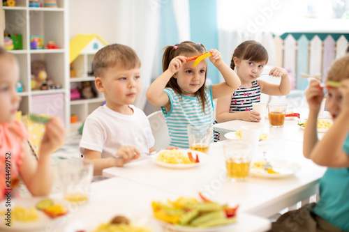 funny children eating veget...