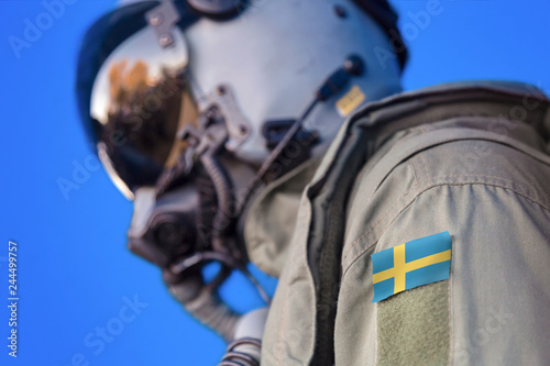 Air force pilot flight suit uniform with Sweden flag patch. Military jet aircraft pilot 