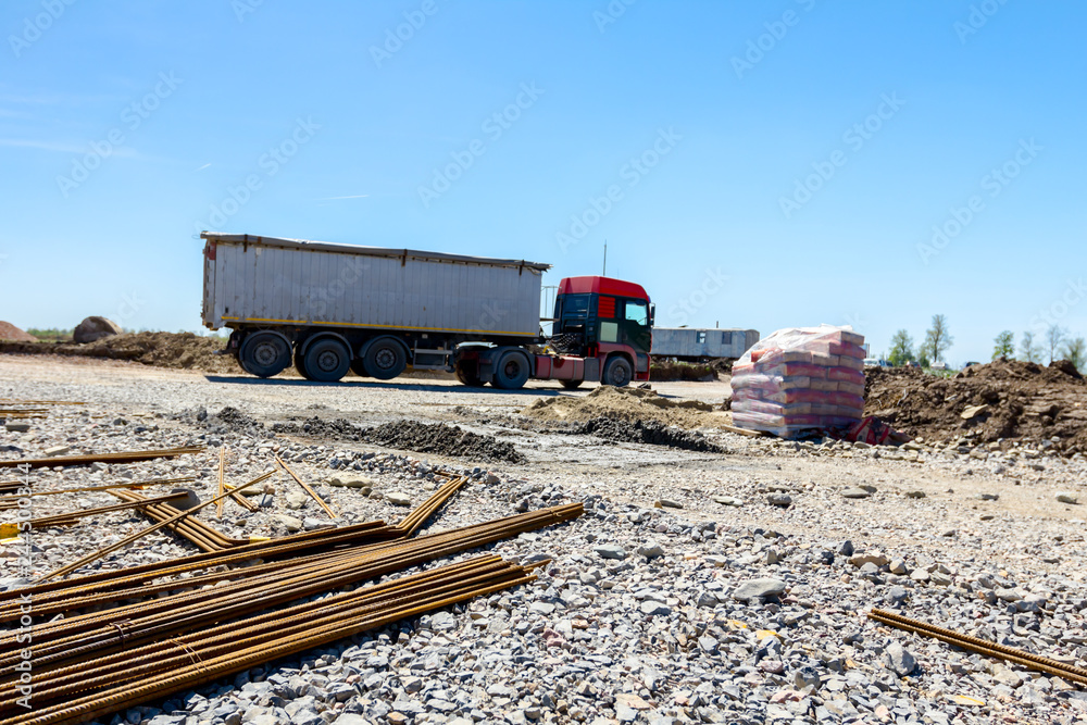 Fototapeta premium Truck transport, logistics on building site