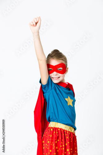 Fotografia pretty blonde supergirl with red mask and red cape