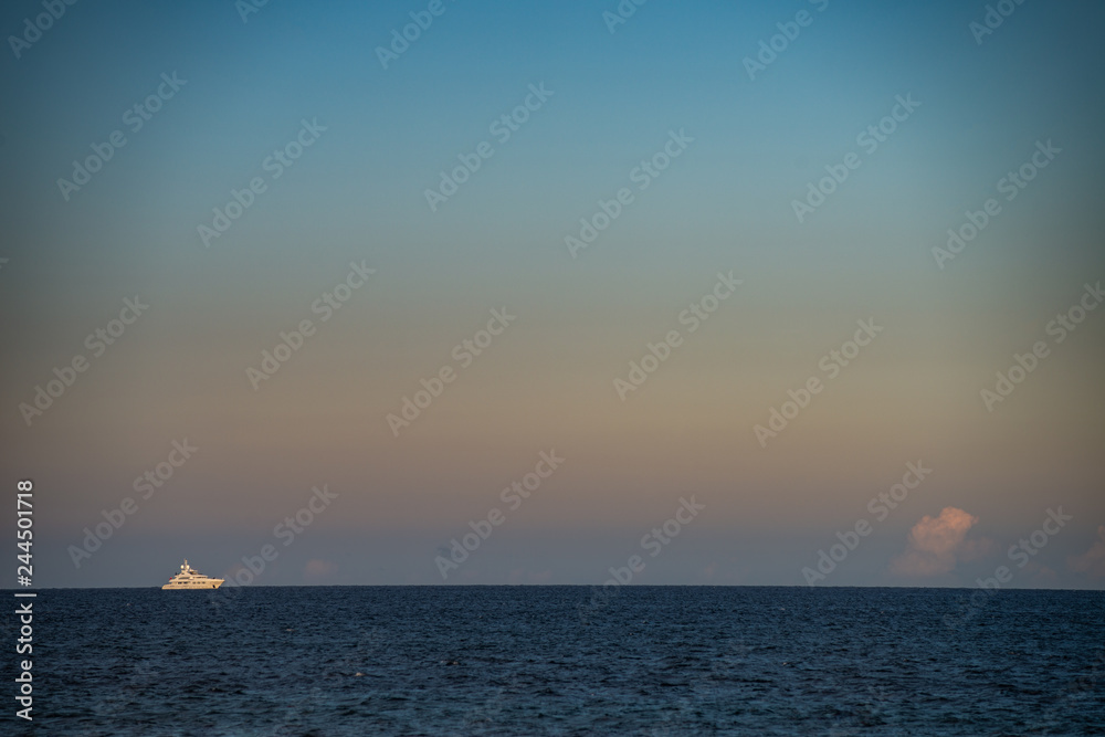 superyacht in navigazione at sunset