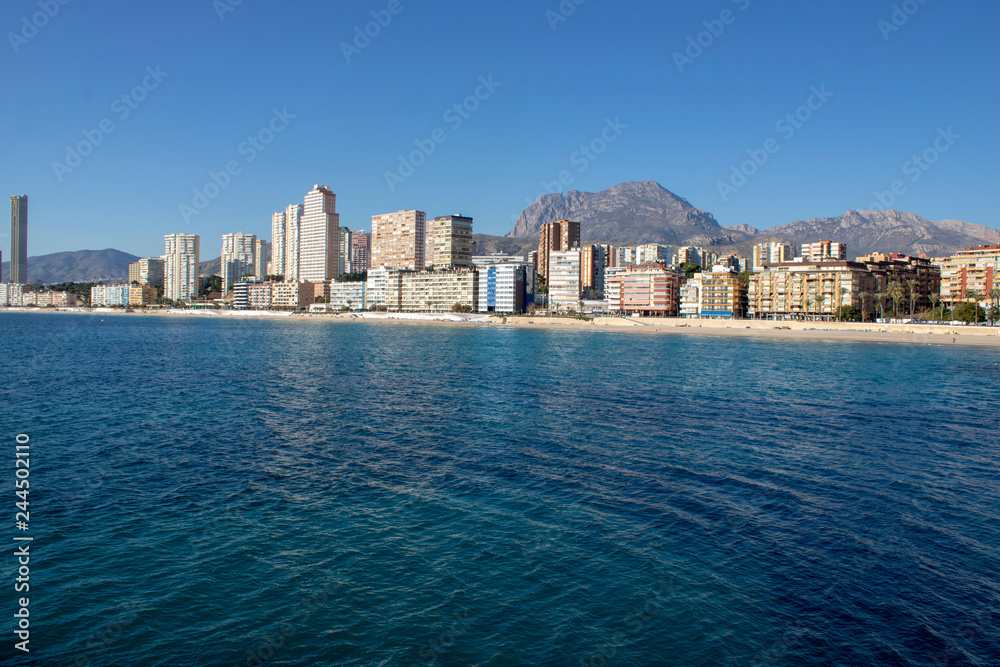 Aerial photo showing the whole of Benidorm in Alicante, you can see everywhere included Playa de Levante beach, Balcón del Mediterráneo and all the high rise hotels.