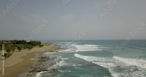 beautiful view from the top of the ocean with waves photo