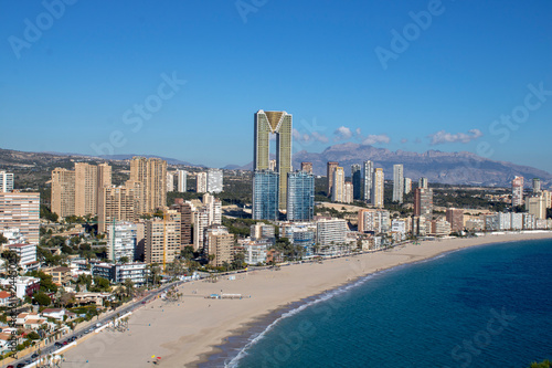 Aerial photo taken in Benidorm in Spain Alicante, showing the beautiful beach of Playa Levante and hotels, buildings, and high rise skyline cityscape. © Duncan