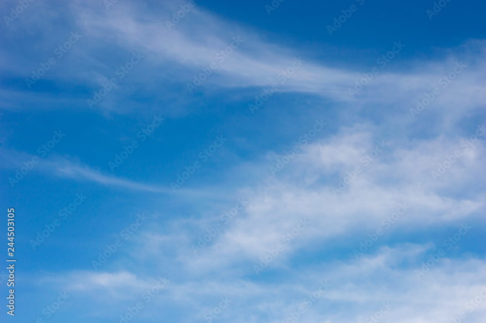 Naklejka premium blue sky with white clouds