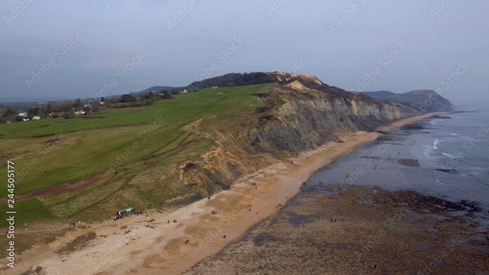 Rising Twisting Aerial Shot of Charmouth Bay in Dorset Rising Twisting Aerial Shot of Charmouth Bay in Dorset