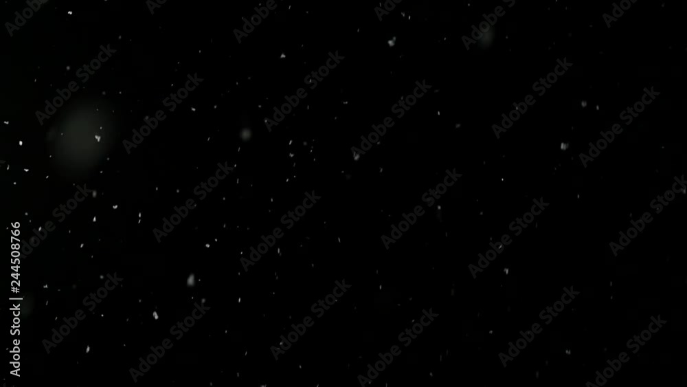 snow falls slowly in night winter. slow motion