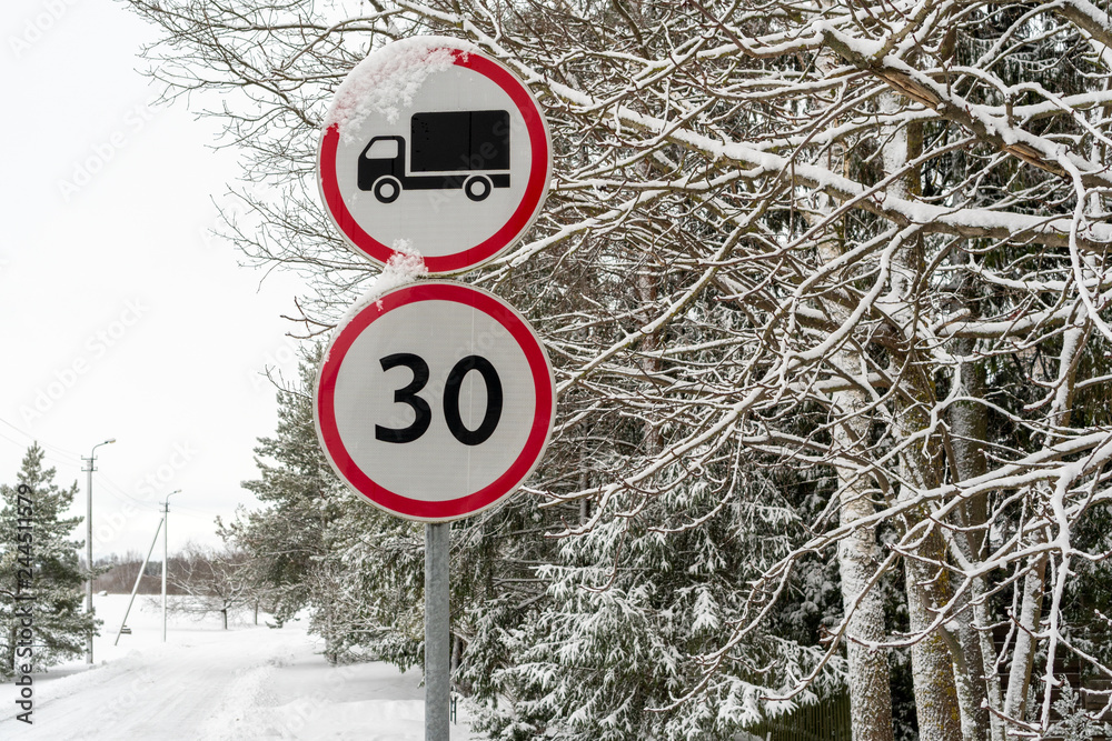 Truck prohibited and the speed limit signs Stock Photo | Adobe Stock